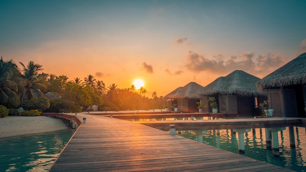 StayVista Resort hillside villas at sunset